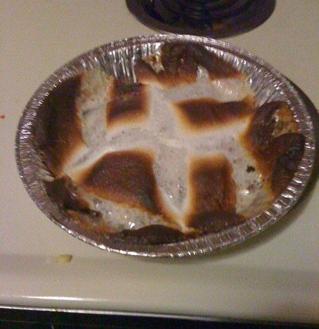 nazismores.jpg They started out as marshmallows, and in their change to s'mores, something horribly wrong happened. I think some Nazis got ahold of them.