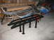 1994 Ford Bronco - Pair of black side steps with square mounting plates, likely for an SUV or truck.