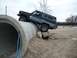 1989 Ford Bronco - This Chevrolet K5 Blazer is navigating an obstacle course made of large concrete pipes.