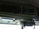 2003 Peterbilt 379 - Interior view of a truck's overhead console showing a CB radio and a stereo unit.