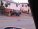 1986 Ford Bronco - This SUV is parked on a very steep street, with its spare tire mounted on the rear door.