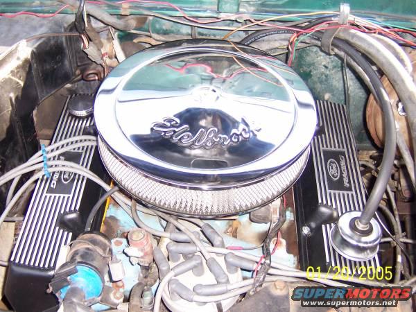 Engine bay with chrome Edelbrock air cleaner and Ford Racing valve covers