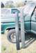 1979 Ford Bronco - Comparing two trim pieces next to a 1978 Ford Bronco. A second vehicle is visible in the background.