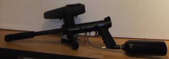 Black Tippmann 98 Custom paintball gun with CO2 tank