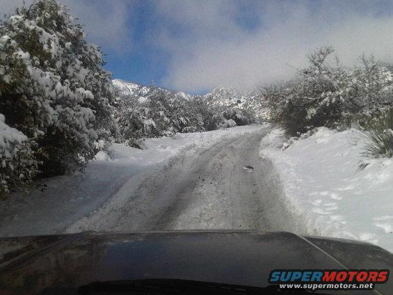 Driving on a snowy road in the mountains