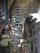 1979 Ford Bronco - Vehicle suspension coil spring and tire detail.