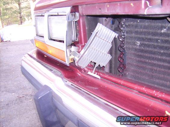 1988 Ford Crown Victoria LTD front end with broken headlight assembly detached
