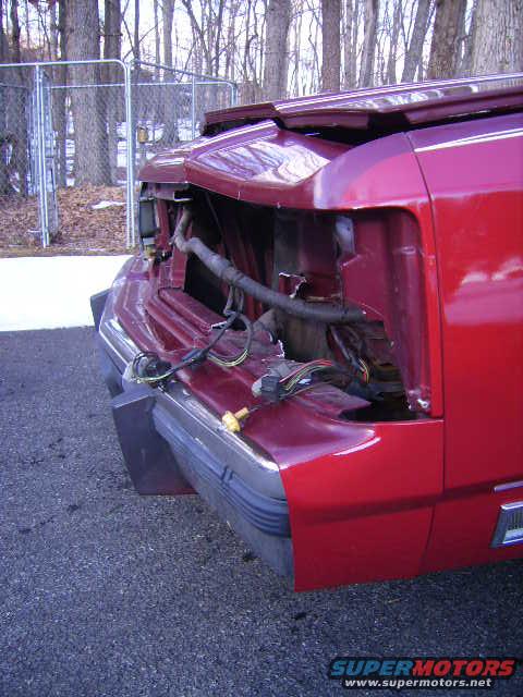 Red 1988 Ford Crown Victoria LTD with front end damage