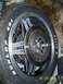 1982 Honda GL1100I GW Interstate - Close-up of a motorcycle wheel a Dunlop Elite II tire and a disc brake assembly.