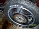 1982 Honda GL1100I GW Interstate - Motorcycle wheel and brake rotor detail, with visible tire text and a date stamp.