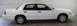 1994 Honda Accord - A white sedan is shown from the side in an indoor setting with a plain wall in the background.