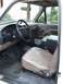 1996 Ford Bronco - Interior view of a 1992 Ford F-150, showing the tan leather seats and dashboard.