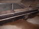 1963 Ford Galaxie - This 1963 Ford Galaxie sedan shows significant rust and wear, with its hood propped open.