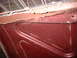1963 Ford Galaxie - Corrosion and rust are visible on the edge of a car's hood.