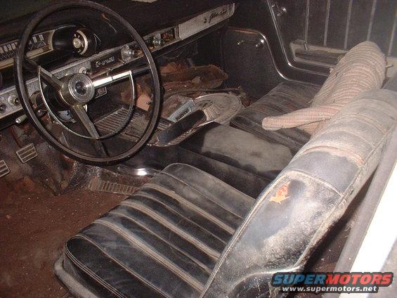1963 Ford Galaxie interior showing dashboard, steering wheel, and front seats
