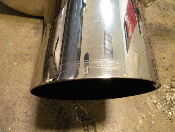 Exhaust tip with engraved 'JDM' logo