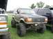 1986 Ford Bronco - Modified 1986 Ford Bronco on display at the Essex Junction Truck Show, oversized tires and a lifted suspension.
