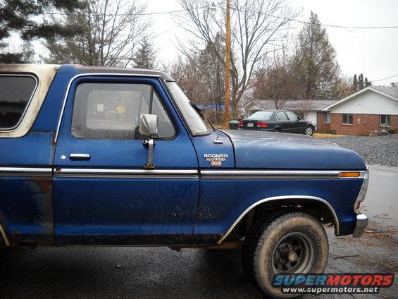 Blue 1978 Ford Bronco side view with white roof