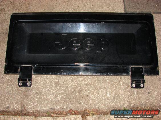 Black Jeep tailgate with embossed lettering