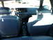 1997 Ford Crown Victoria - The interior of a 1997 Ford Crown Victoria is shown from the back seat looking forward.