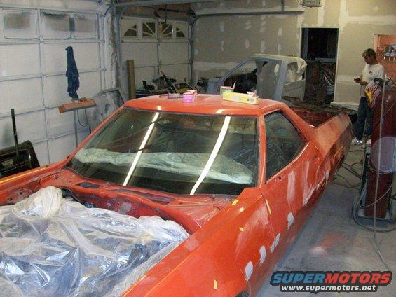 100_0361.jpg Day 2: the block sanding will start now, and the holes we welded up got ground flat and a spot of bondo.