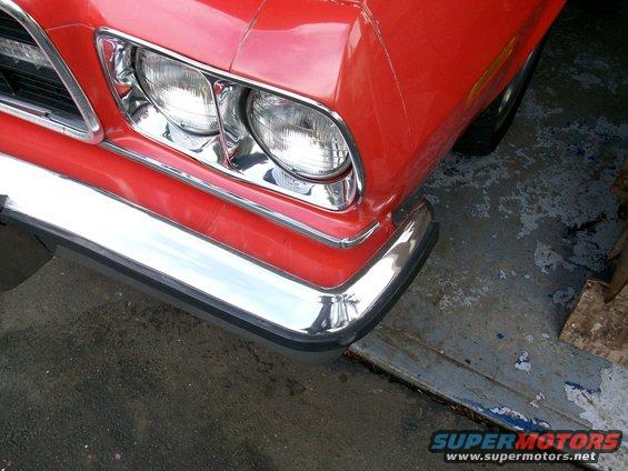 100_0284.jpg I'm going to remove the light buckets; they aren't lined up correctly and there is a lot of was and paint in the gap where they mate.