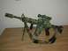 1989 Ford Bronco - This assault rifle features a camouflage pattern and is equipped with a bipod, scope, and sling.