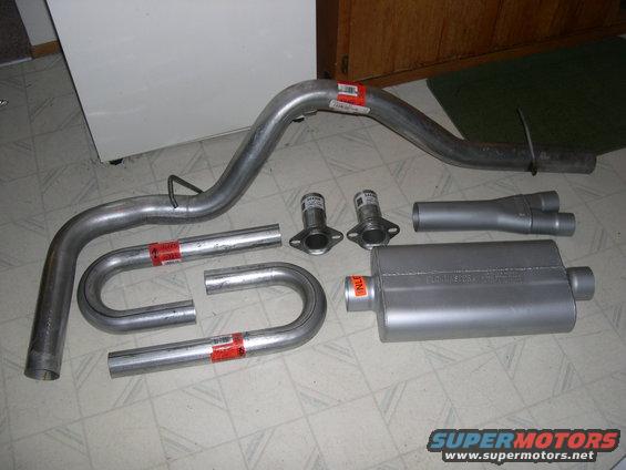 New shiny stuff, Flowmaster 50 series, 3" dynomax tailpipe. Not pictured is a Walker 3" high flow cat.