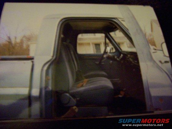 100_3132.jpg Interior view from the passenger door showing the bucket seats, the tach, and the rest of the interior.