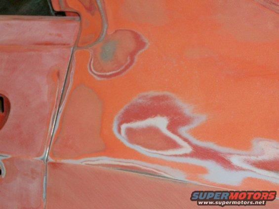 100_0388.jpg the car was originally 2B "bright red", then it was painted orange, then repainted the current orange; most of the fenders, half of the doors and half the roof had a clear coat on them as well.