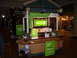 1991 Ford Bronco - A retail kiosk for Clear mobile internet services is set up inside a shopping mall, promotional signage and product displays.