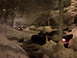 2007 Subaru Impreza - A winter storm blankets parked cars and trees on a street at night.
