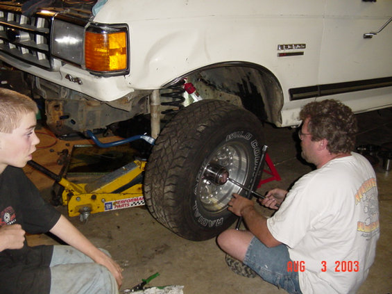 87-work-begins-155.jpg We put the tires on and set it on the ground, all that is left is steering.