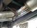 1995 GMC Sierra 1500 - Underside view shows the exhaust system and driveshaft of a vehicle.