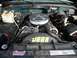 1995 GMC Sierra 1500 - The engine bay of a 1995 GMC Sierra 1500, aftermarket JEGS and Summit Racing Equipment decals.