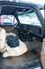 1979 Ford Bronco - Interior view of a 1979 Ford Bronco, showing the dashboard, seats, and floor shifter.