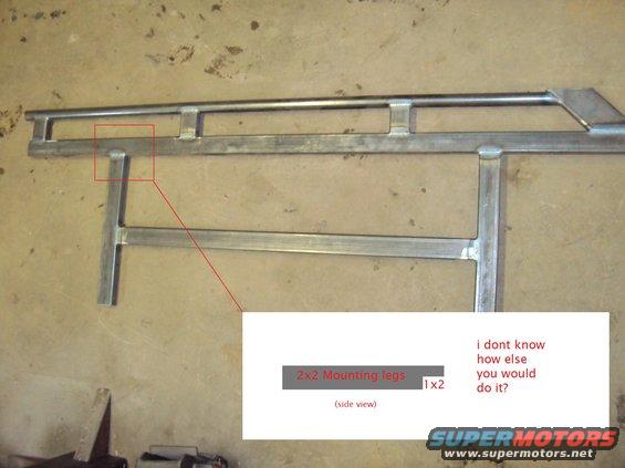 Custom metal rack with 2x2 mounting legs, shown from the side