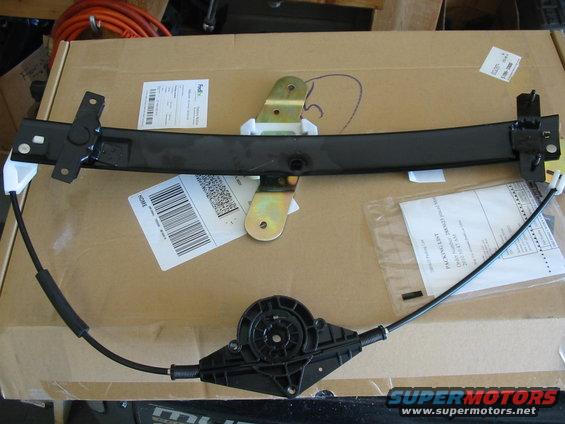 Window regulator part with cables and mounting brackets