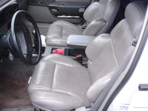 1989 Ford Taurus interior with gray leather seats and steering wheel