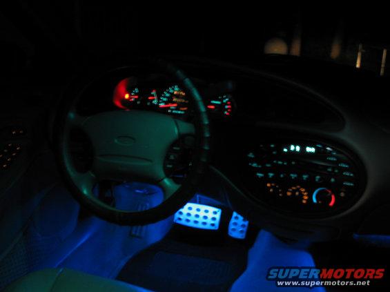 100_0065.jpg here is the neons under the drivers side, illuminating my racing pedals :)