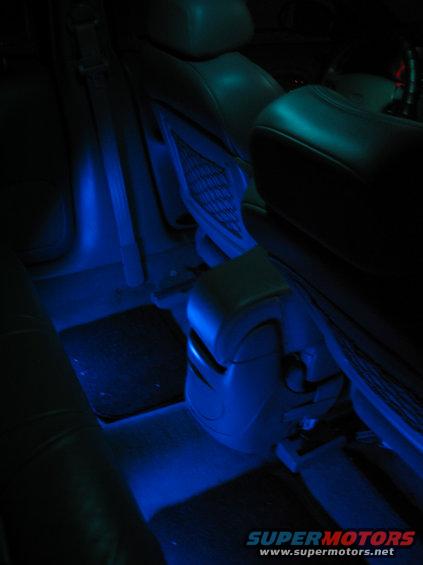 100_0066.jpg This is the best night shot a took, cuz i wasnt shaking around, it was coooold for some reason. I love this camera. This is in my backseat with everything illuminated in blue, from the bulbs under the seats