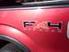 2009 Ford F-150 - The FX4 OFFROAD decal is visible on the side of the red truck.