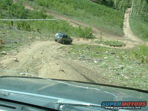 crack.jpg Kind of steep right here, I call those cracks in the windshield the flex cracks, haha, I replaced it with a new one but 4wheeling certainly doesn't help with small cracks already in there.