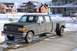 1989 Ford F-350 - This crew cab dually pickup truck features a distinctive grille and body style consistent with the late 1980s.
