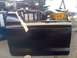 1978 Ford Bronco - A car door is prepped for painting in a workshop environment.