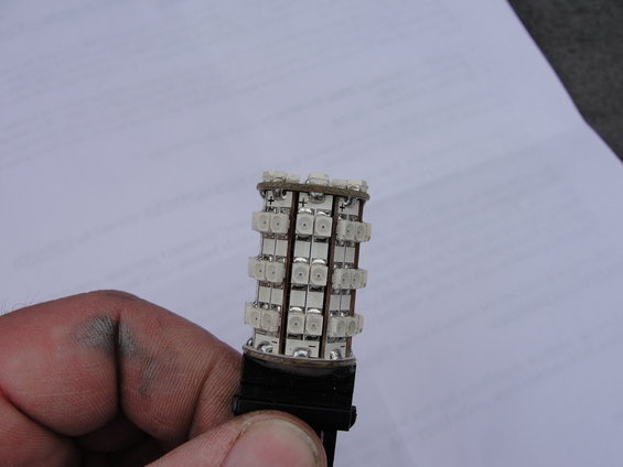 LED bulb with many small diodes, held in a hand