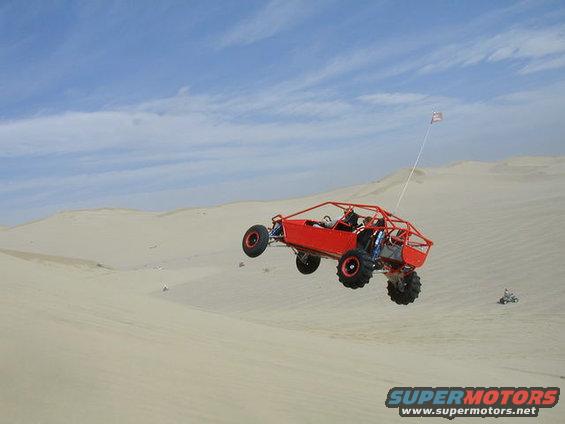 normal_p2162475.jpg Ryan jumping at Dumont Dunes