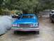 1973 Ford Ranchero - Blue 1974 Ford Ranchero in front of another vehicle, parked outdoors.
