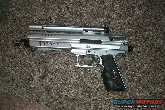 Silver paintball gun with black grip