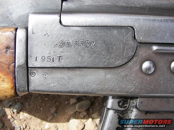 Close-up of firearm receiver showing serial numbers 3П6637 and 1951T